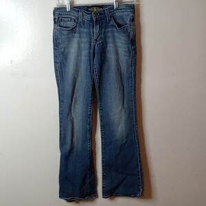 Lucky Brand 2/26 women's midrise distressed blue jeans.